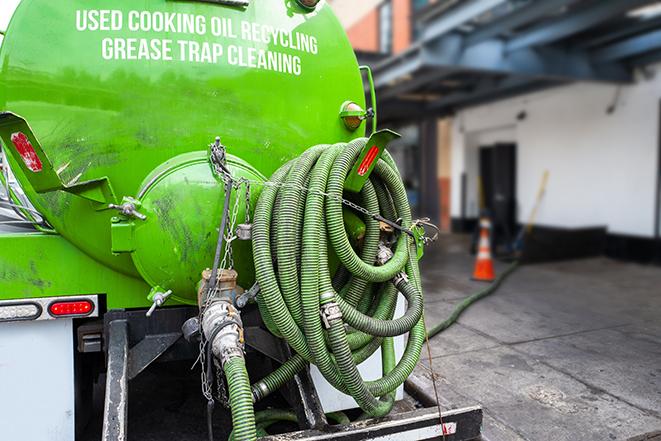 septic tank pump truck in operation in Ama